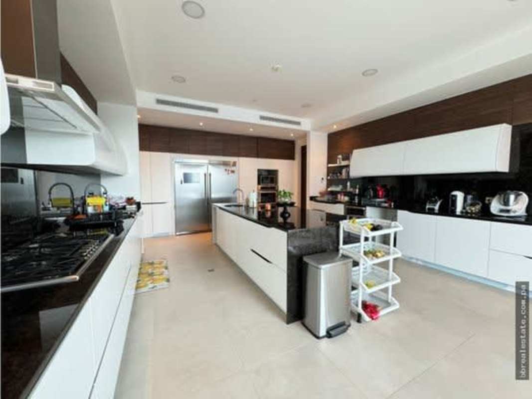 Elegant bathroom with marble finishes and ocean view window in PH Marea II