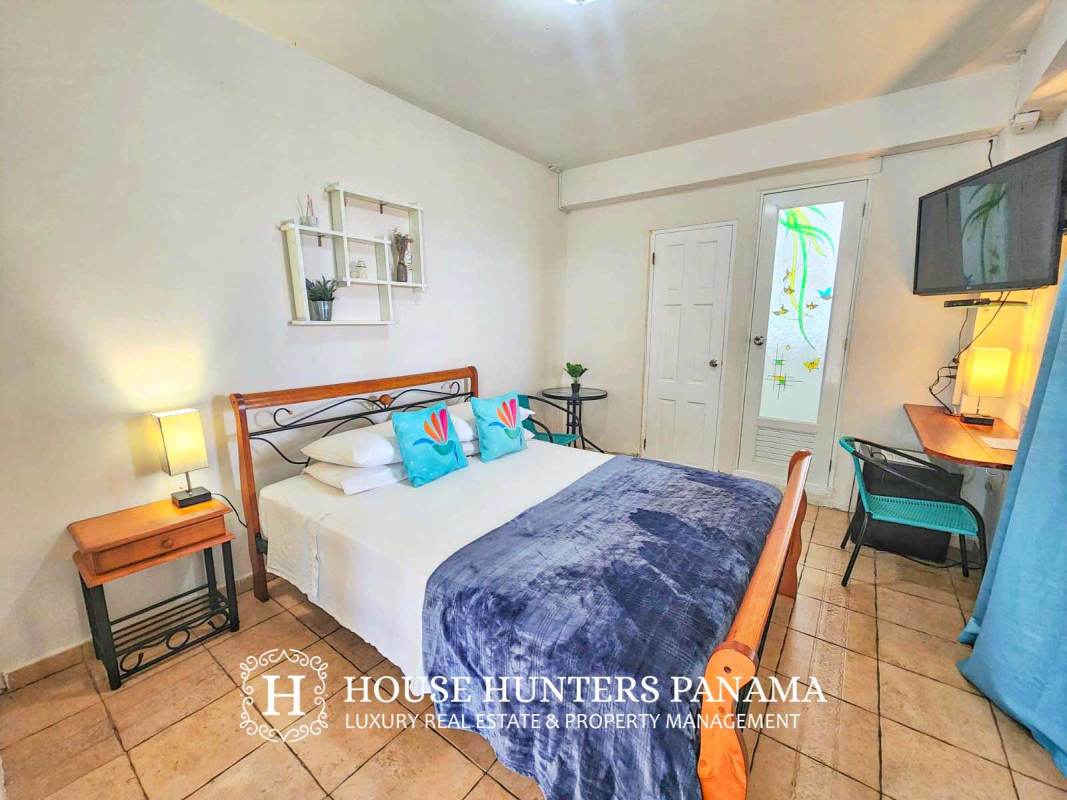 Outdoor covered dining terrace with ocean views at Isla Taboga boutique hotel Panama