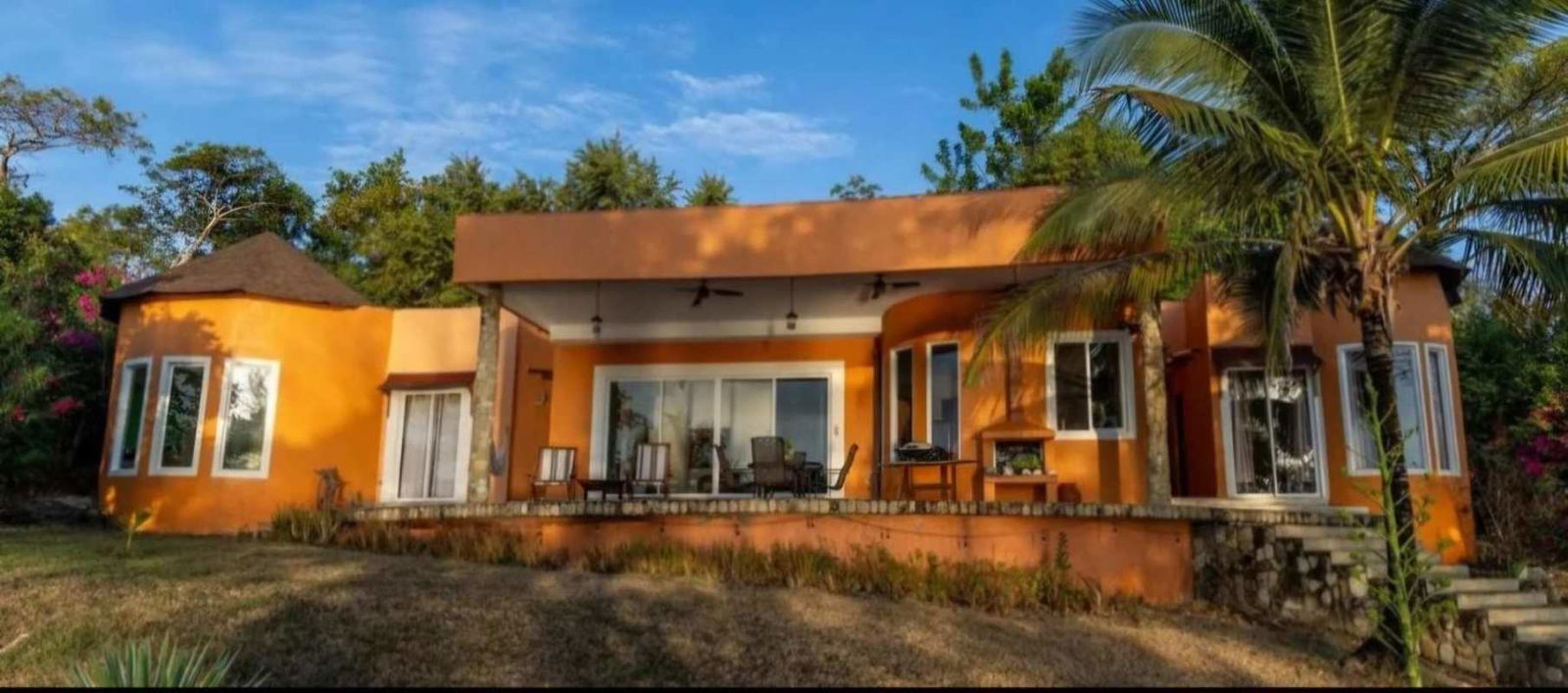 Tropical beachfront villa facade Isla Saboga Panama