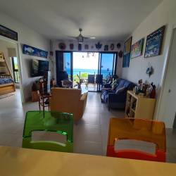 Luxury beachfront condo community Punta Caelo with resort pools lush landscaping ocean backdrop Panama