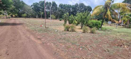 Open countryside terrain ideal for development near Coronado Panama beach community with greenery