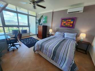 Second bedroom with expansive golf course view in PH Coronado Golf fully furnished condo