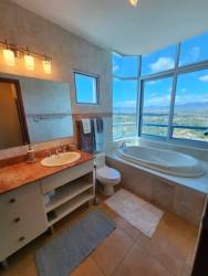 Master bedroom with panoramic ocean views from PH Coronado Golf condo for sale