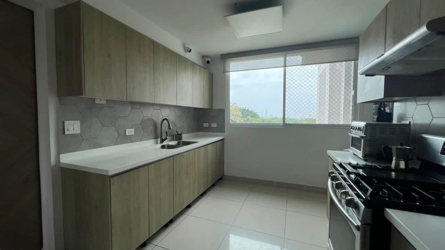 Kitchen with large window white countertops stainless appliances PH Forest Gate Albrook Panama