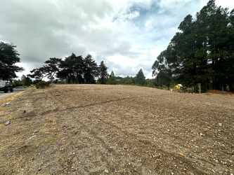 Paved road side lot with mountain and trees Paso Ancho Volcán Chiriquí Panama