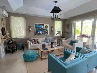 Luxury townhome private pool overlooking lagoon surrounded by palm trees in Buenaventura Panama