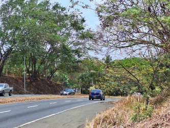 Corner lot with pedestrian access and highway frontage ideal for retail or housing