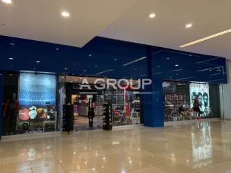 Retail store space with shelving displays in Westland Mall Panama