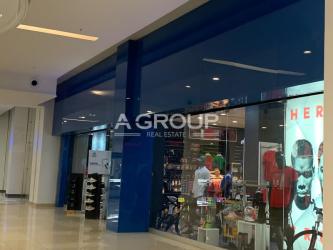 Retail store space with blue facade inside Westland Mall shopping center Panama Oeste