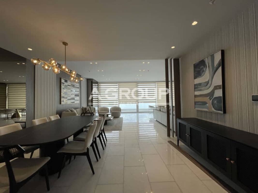 European-style luxury kitchen with marble countertop, waterfall island, modern cabinetry in The Towers Punta Paitilla Panama