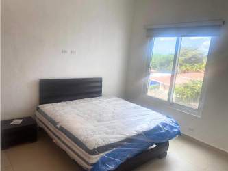 Bright bedroom with ocean or garden views Punta Barco Village Panama