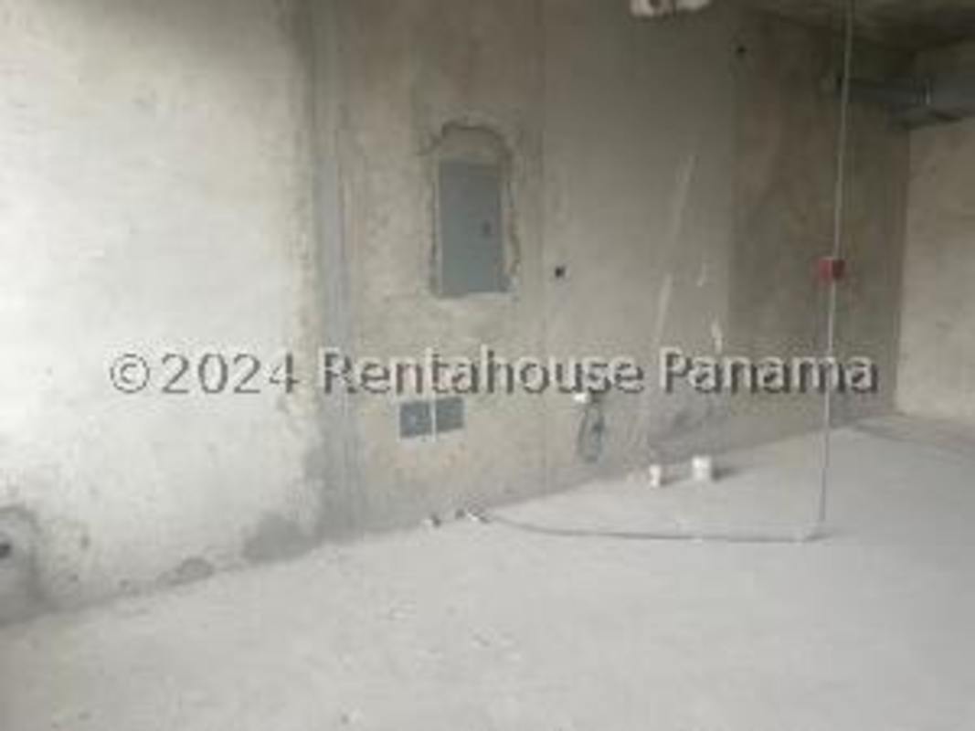 Raw shell condition medical office space with exposed concrete walls in Panama City