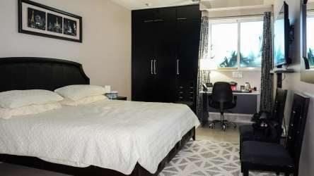 Fully equipped kitchen with premium granite and teak cabinets Ocean Waves Panama