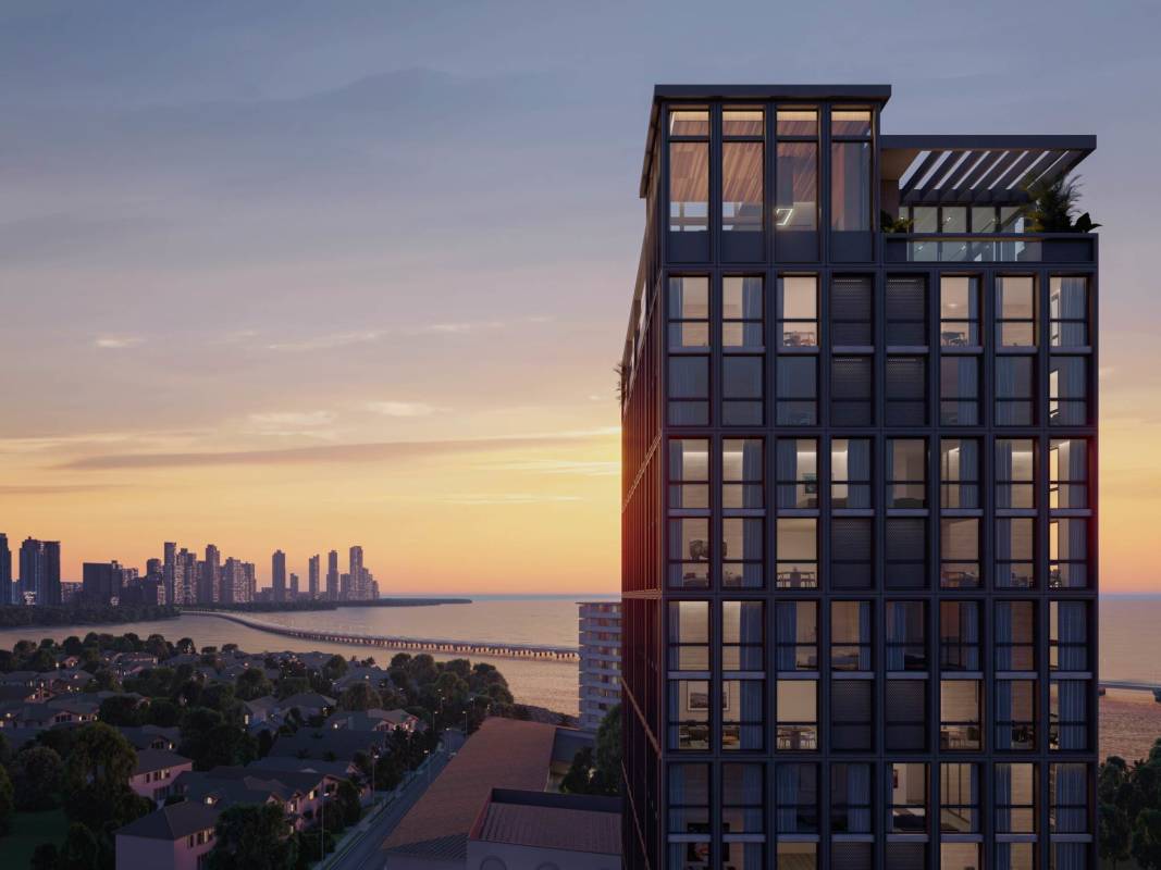 Contemporary open kitchen and dining area with minimalist design at PH TRBL Coco del Mar