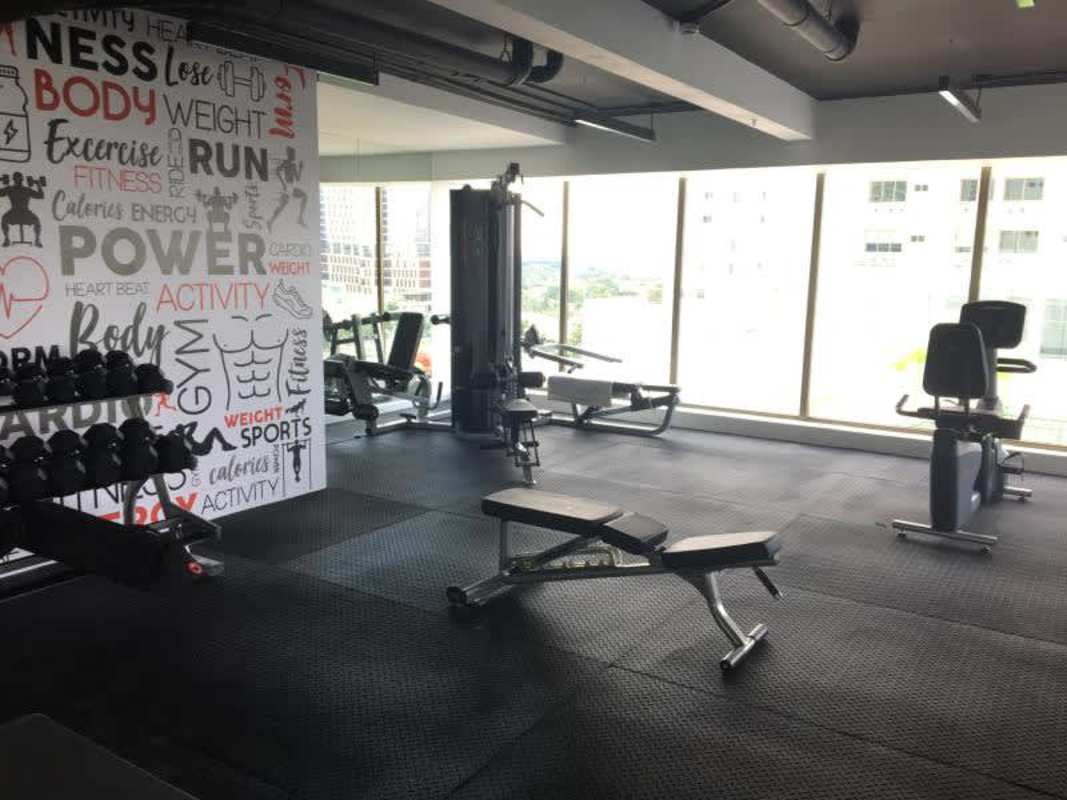 Fitness center with equipment large windows PH Park Lane Costa del Este Panama