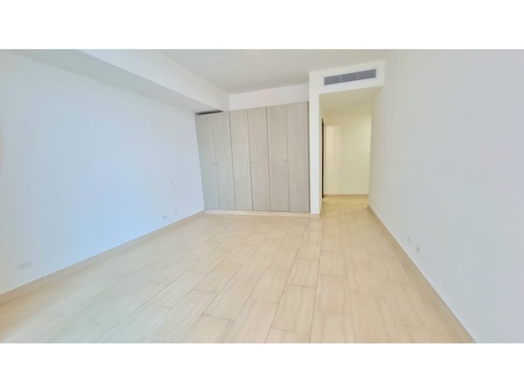 Spacious open kitchen with granite counters and city views in PH Grand Tower Punta Pacifica