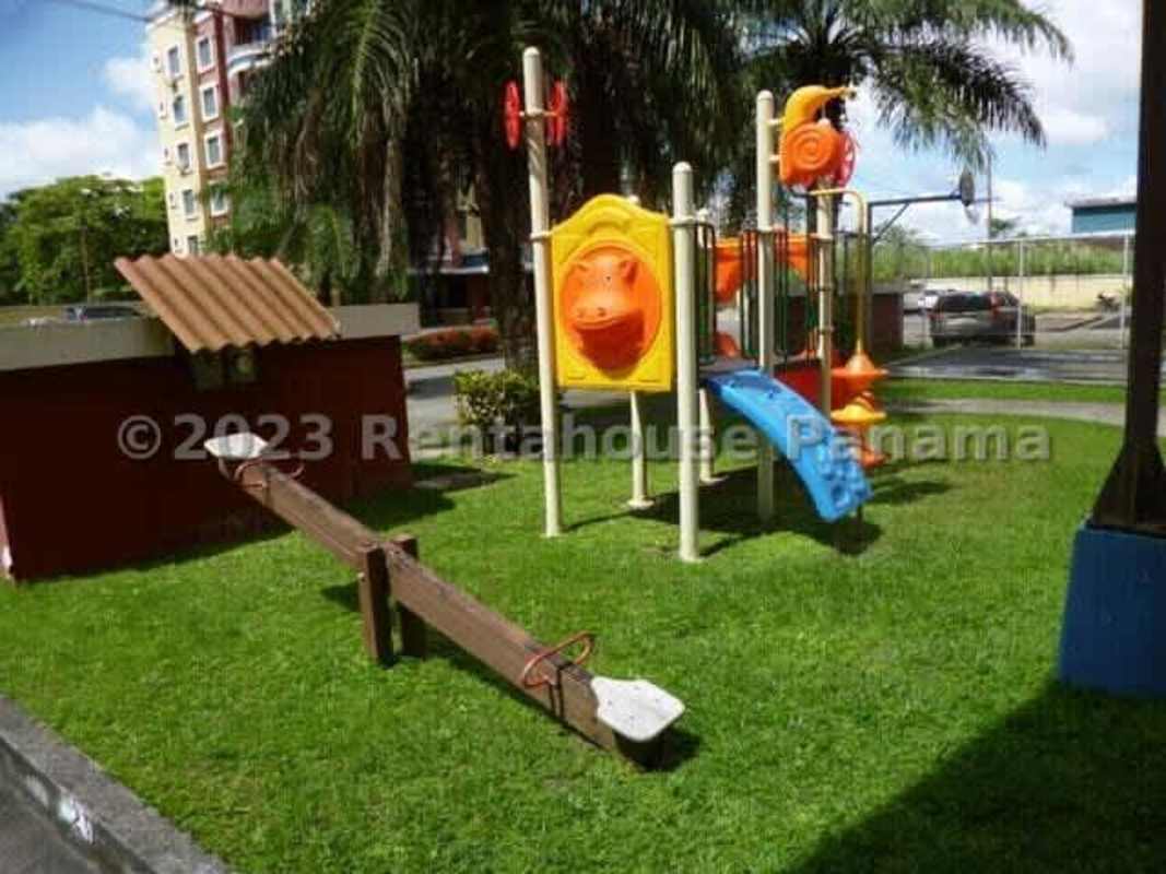 PH Condado Country Club exterior view with swimming pool and gardens in Condado del Rey Panama