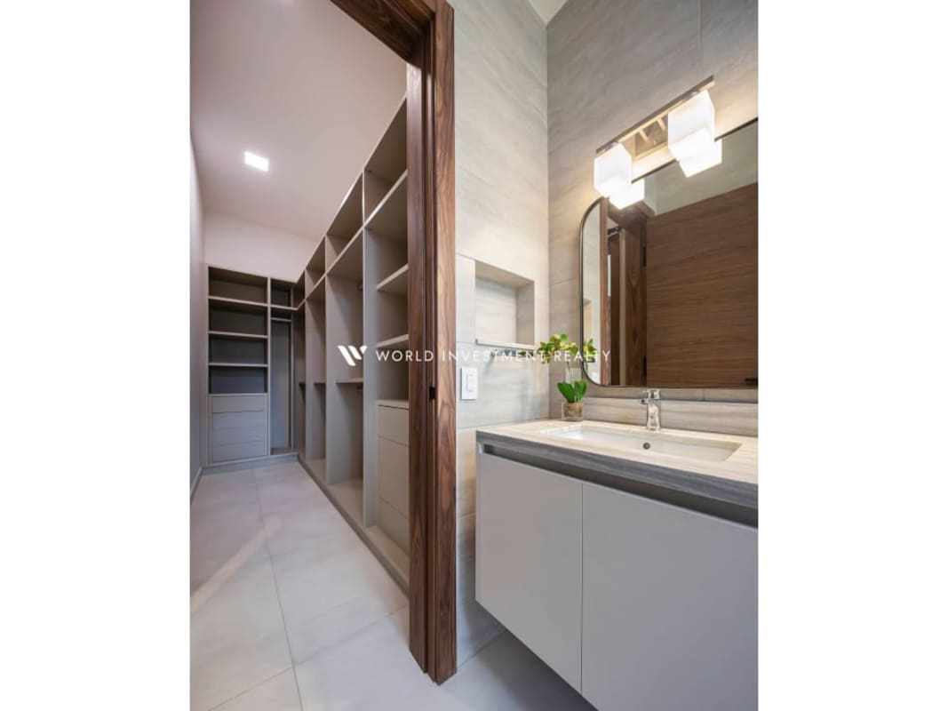 Spacious kitchen with quartz countertops, stainless appliances in The Woods Santa Maria luxury house Panama