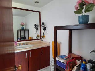 Bathroom with double vanity sink, large mirror in luxury townhouse Costa Blanca Villas Decameron Resort Panama