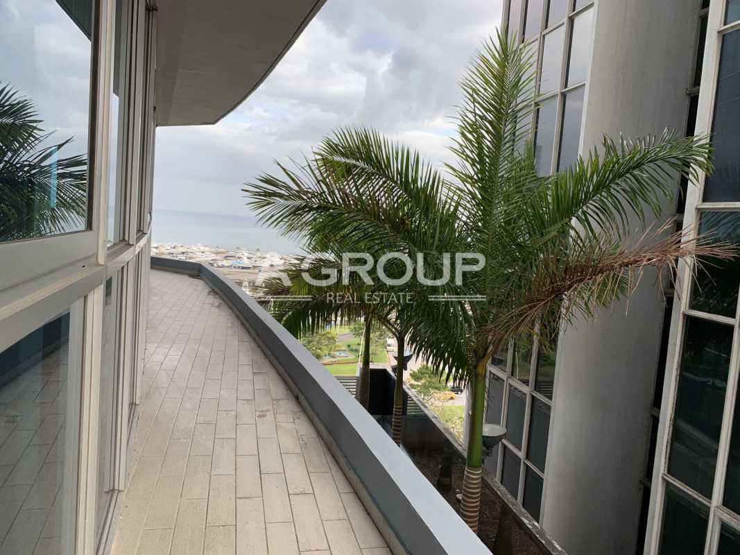 Spacious bedroom panoramic windows balcony ocean view Yacht Club Tower Panama