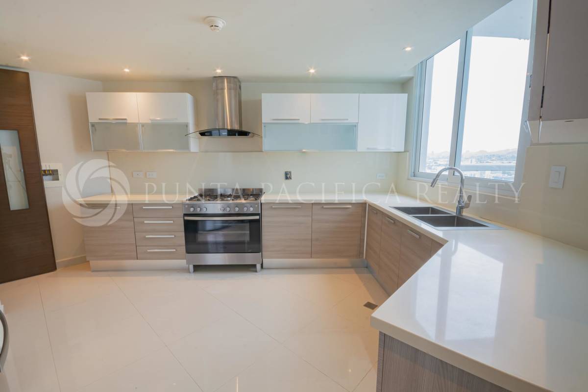 Modern bedroom with large windows partial ocean view PH The Regent Panama