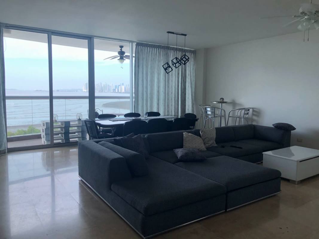 Dining room with oceanfront view, modern décor in Pearl at the Sea Costa del Este Panama