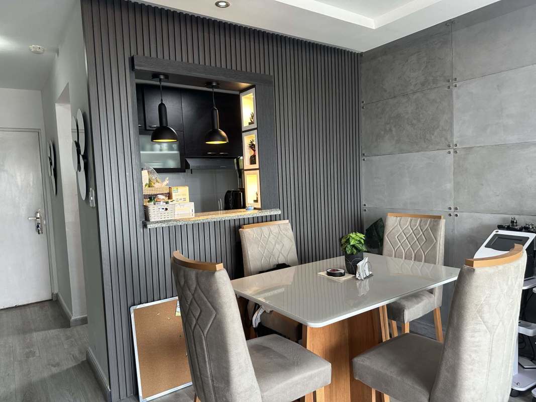 Secondary bedroom with closet space and window overlooking Panama City skyline