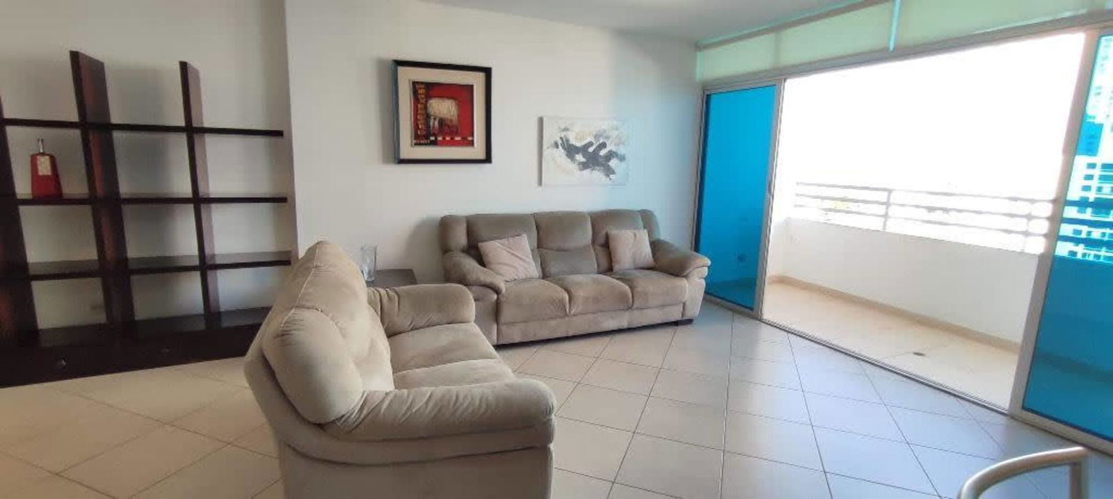 Cozy living area with sliding doors to balcony overlooking city PH Palma de Mallorca San Francisco Panama