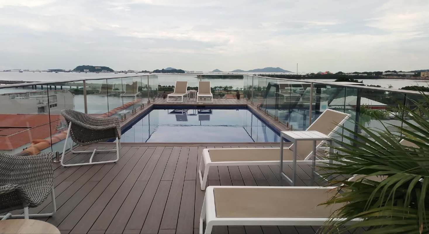 Infinity-edge swimming pool with panoramic sea and city views at PH La Cuadra Casco Viejo Panama