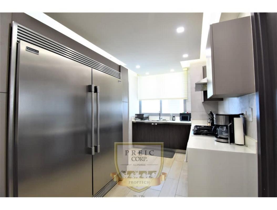 Living room with floor-to-ceiling windows and balcony ocean view in PH Altamar Panama