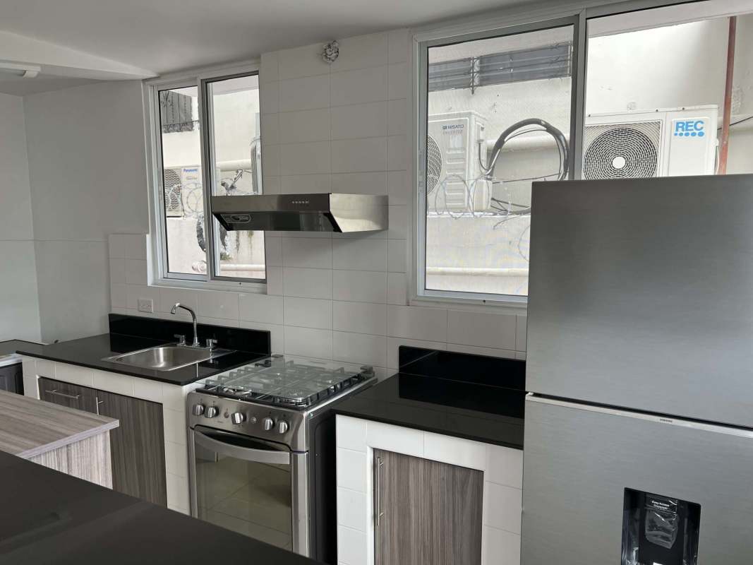 Laundry space washer utility sink modern tiles at PH Villa Hermosa Vía España Panama