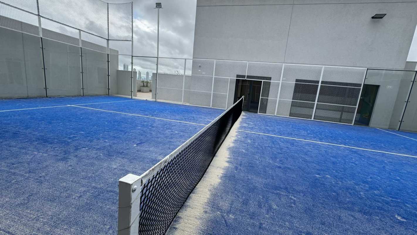 Open modern kitchen with granite countertop and built-in appliances in Ocean House Santa Maria Panama