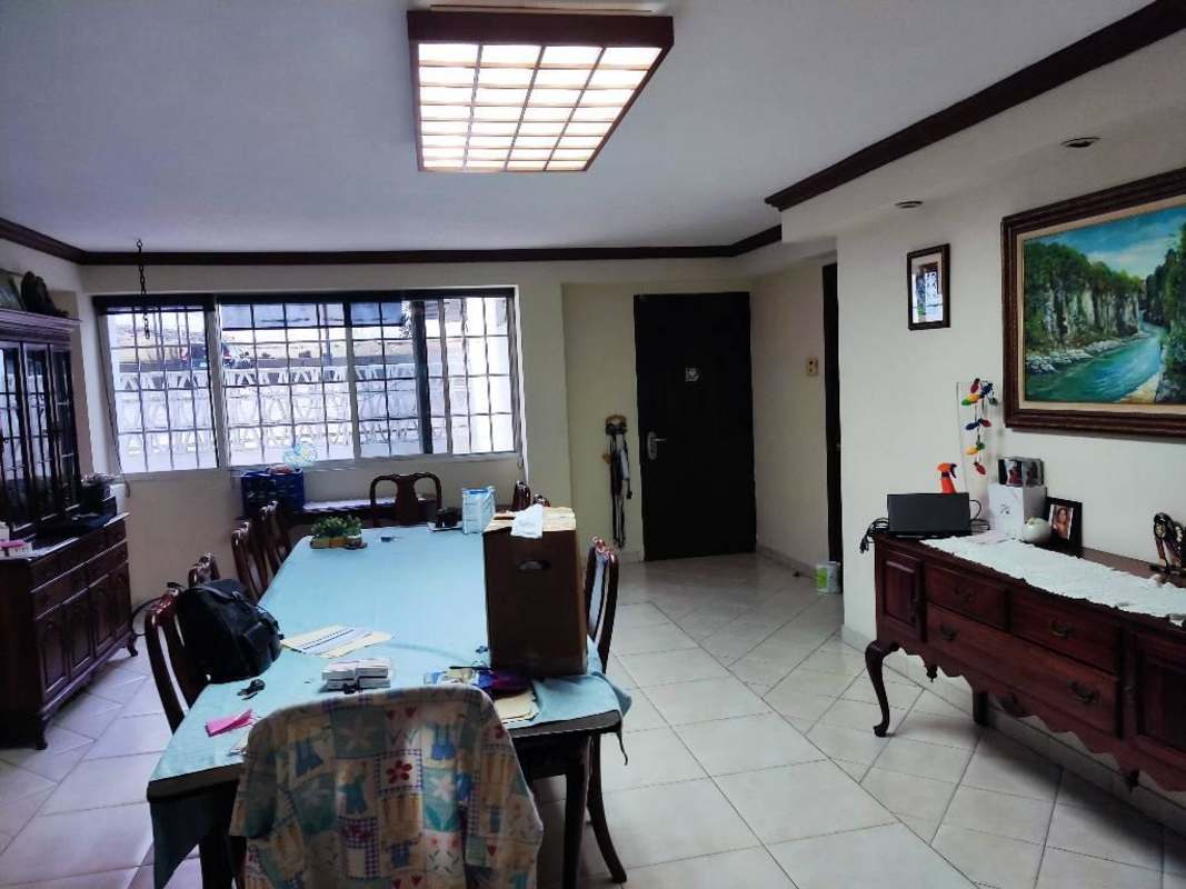 Functional tile kitchen with white and blue cabinetry granite countertop El Cangrejo Panama City