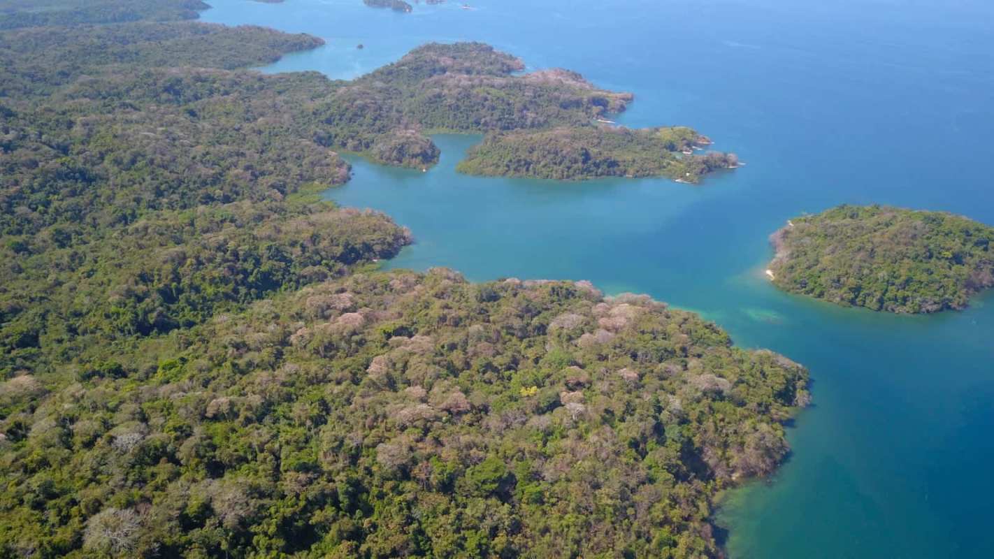 Aerial overlooking pristine tropical islands turquoise waters Pacific Panama