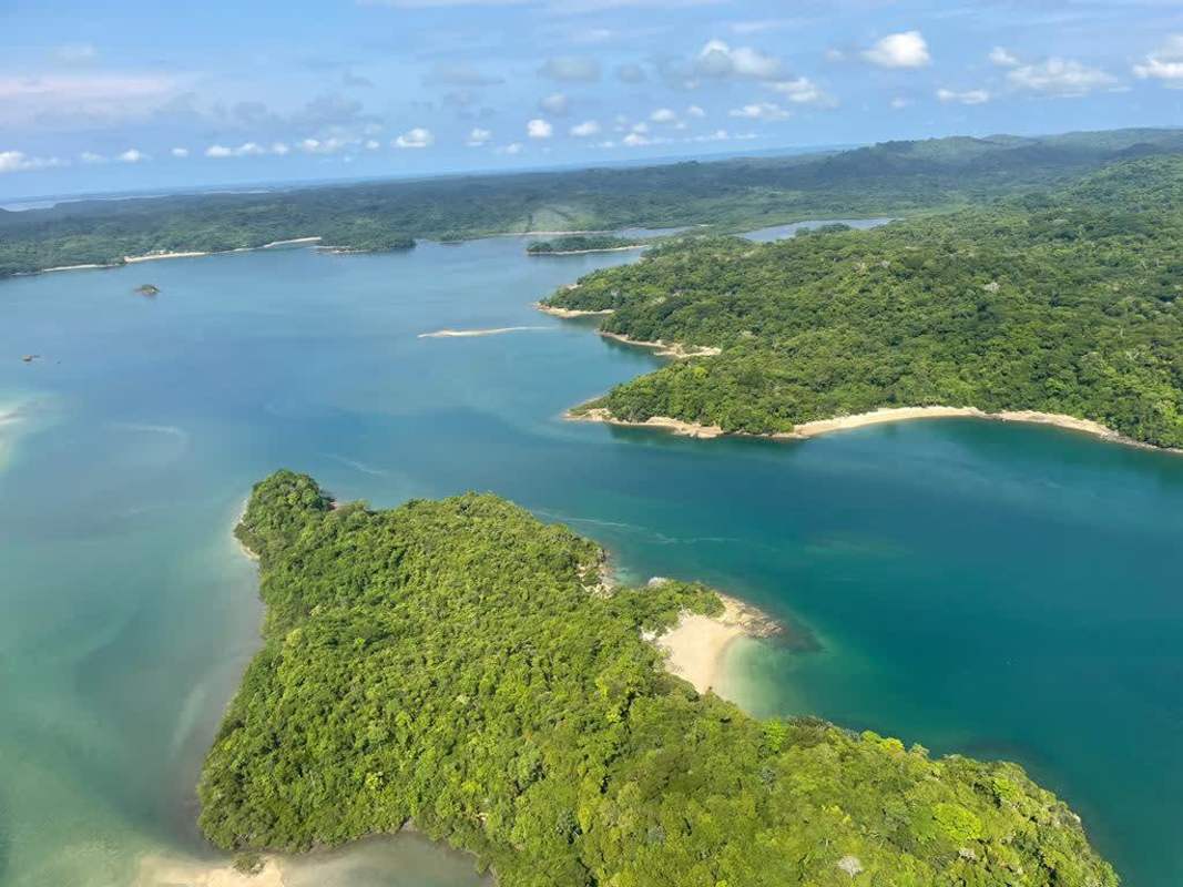 Aerial coastline forested hills beaches Isla del Rey Pacific Panama