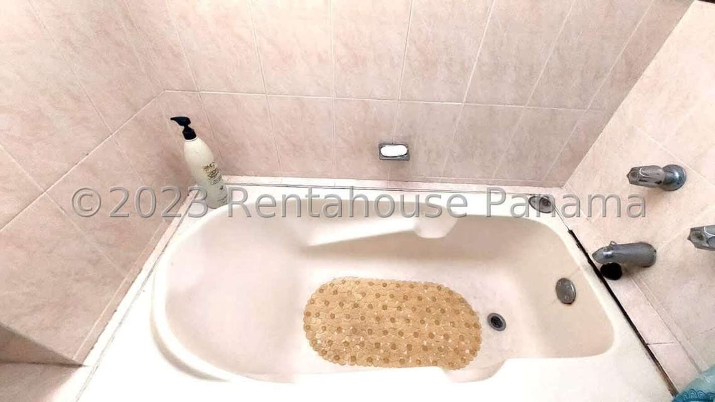 Bedroom with closet space, fan and window natural lighting in PH Miraflores View Betania Panama