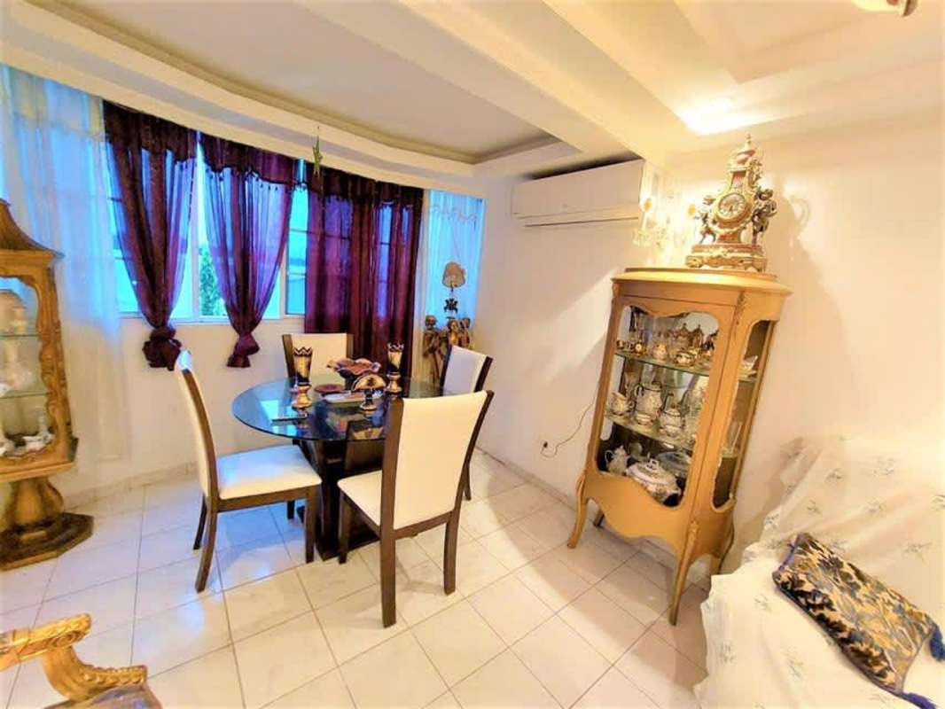 Compact kitchen with white cabinets, appliances and tile floors PH Villas Costa del Este Panama