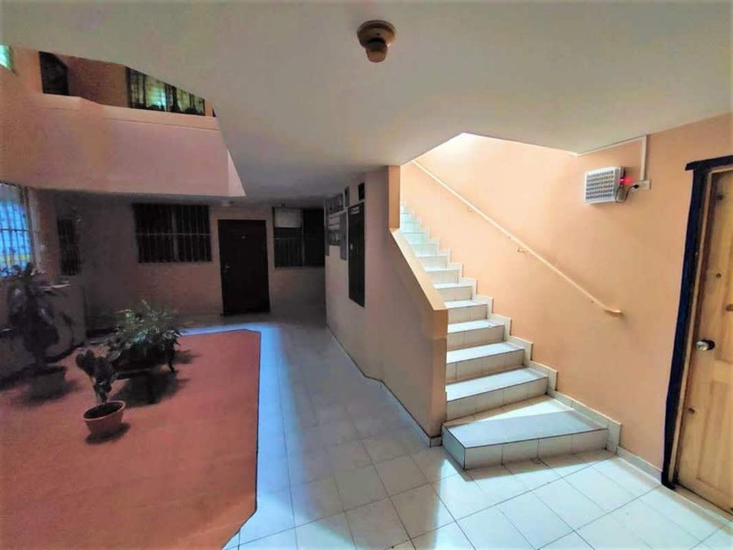Bright living and dining area with ceramic floors at Villas Costa del Este Panama