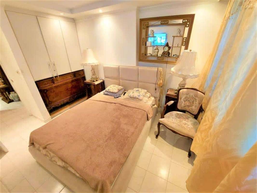 Outdoor pool with fenced area and patio in Villas de Costa del Este Panama