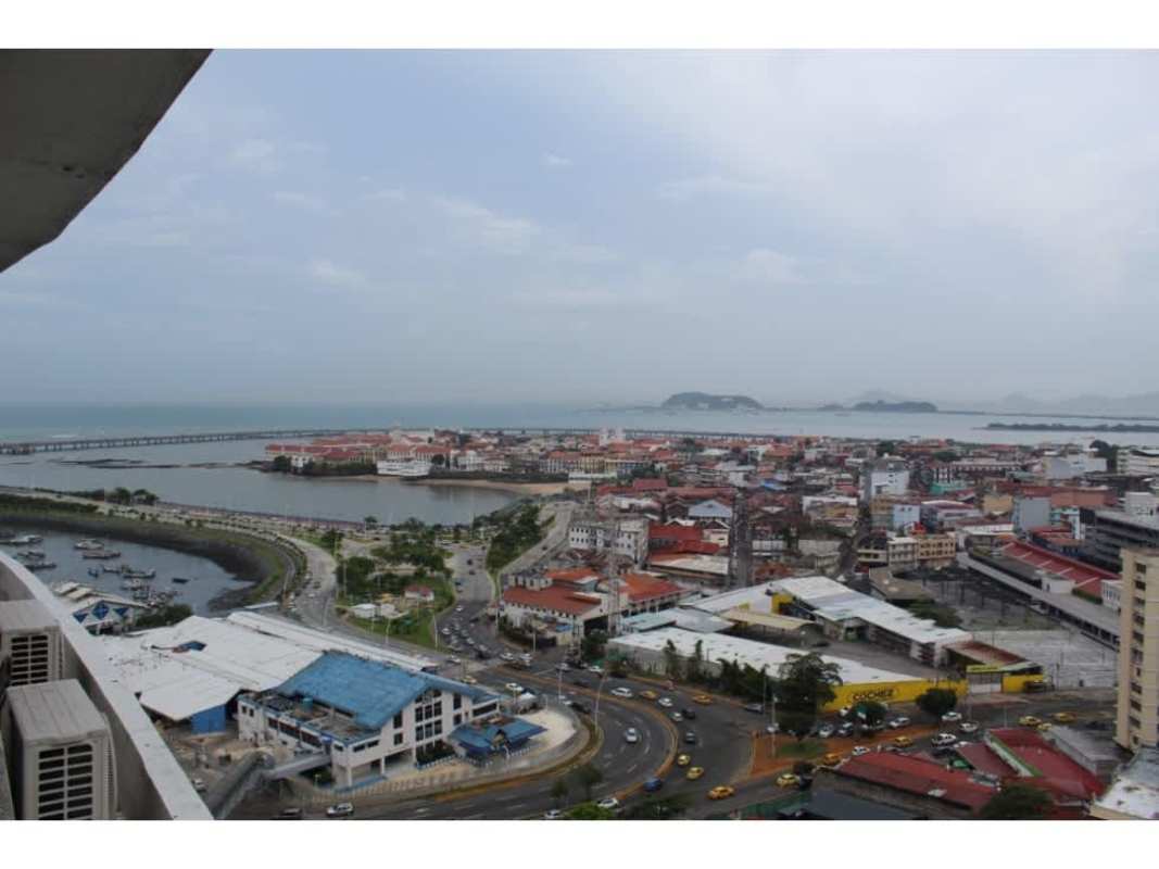 Panoramic aerial shot PH Bayview Avenida Balboa waterfront with skyline and ocean Panama City