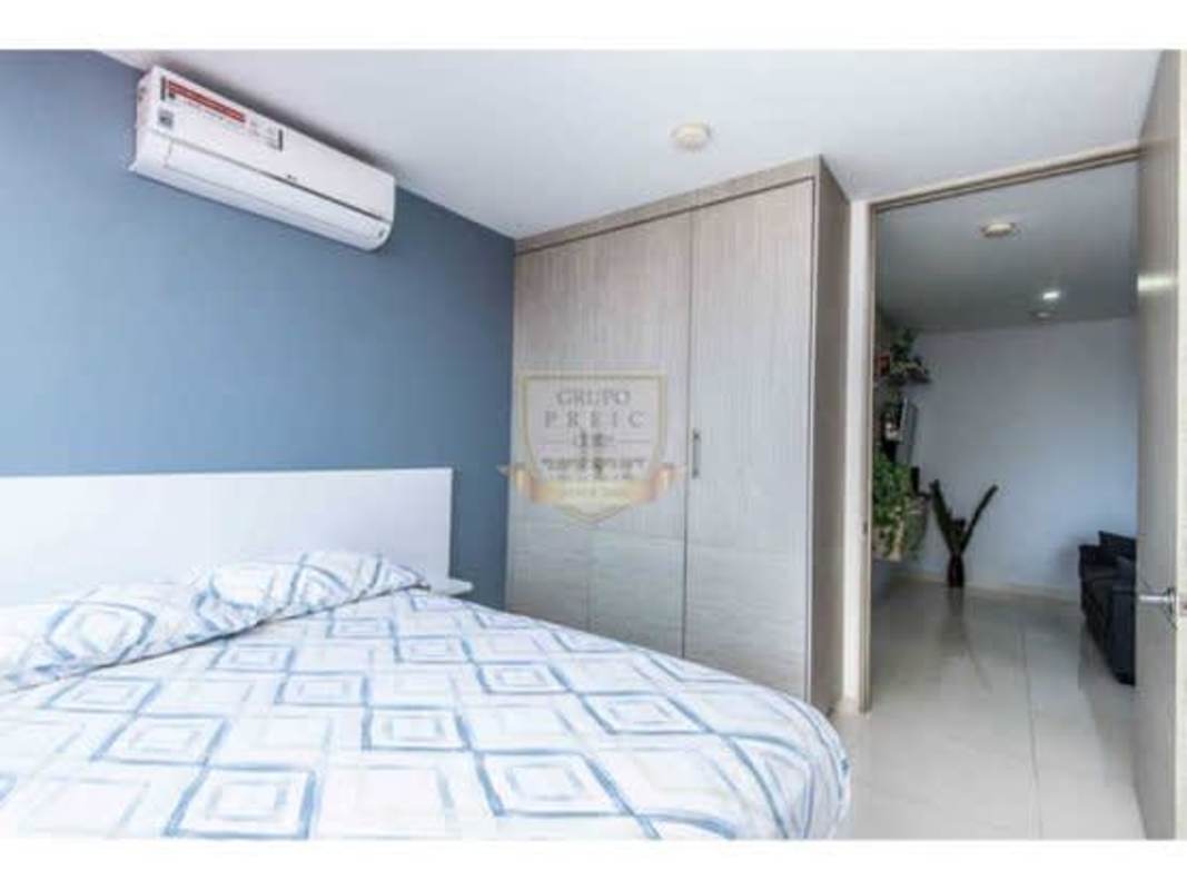 Contemporary bathroom with glass shower and large mirror in Villa Lucre apartment Panama