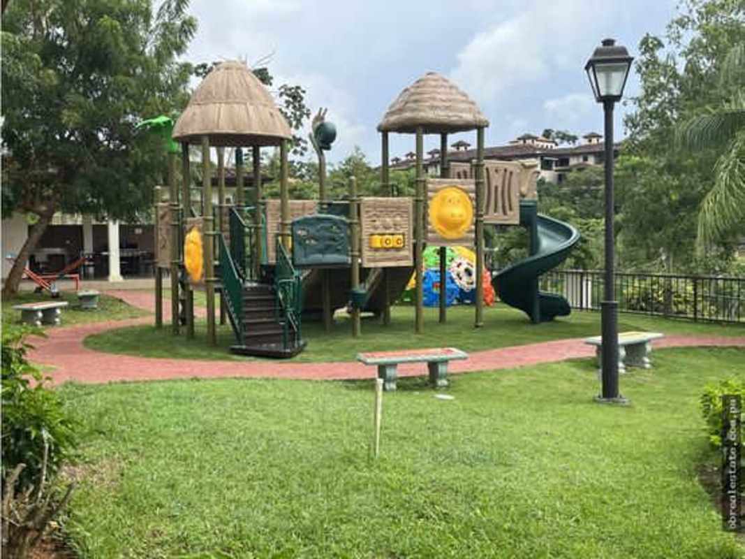 Balcony with garden and pool views Embassy Village Clayton condo Panama