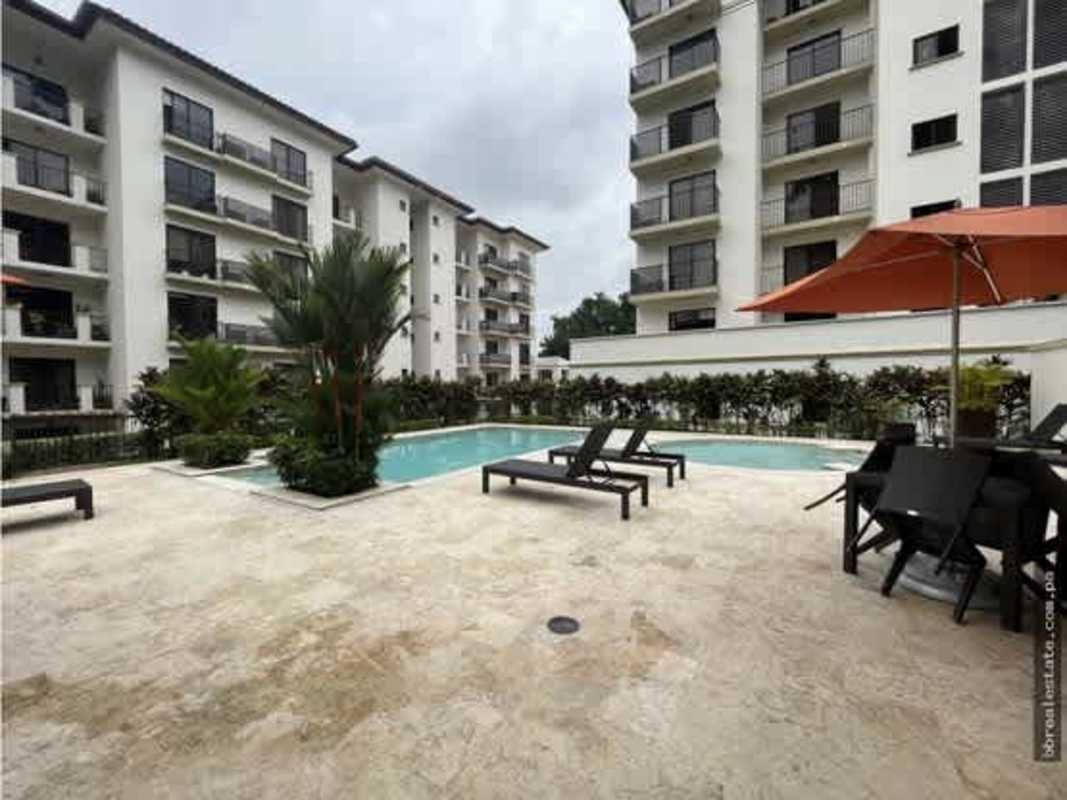 Lush poolside with gazebo lounge embassy village clayton panama apartments