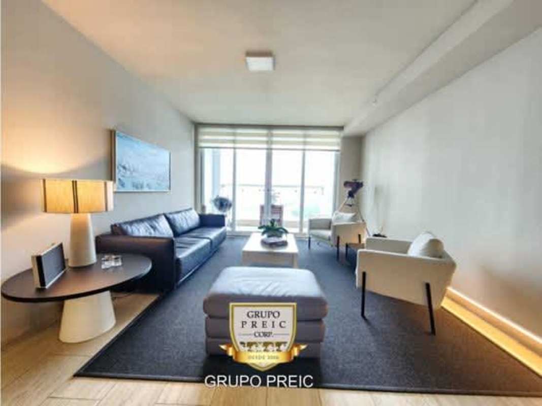 Modern furnished living room with city views at PH Regent Costa del Este