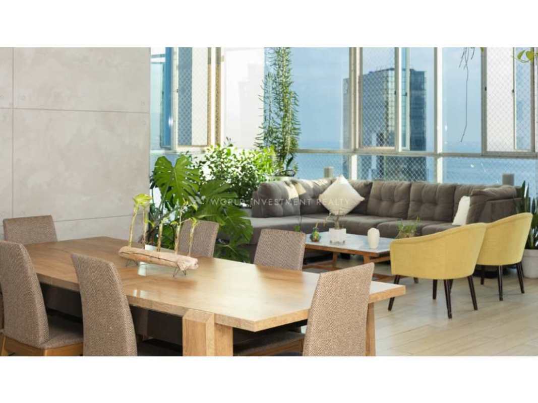 Large open living dining space with double-height ceilings in loft PH Vista Tower Panama