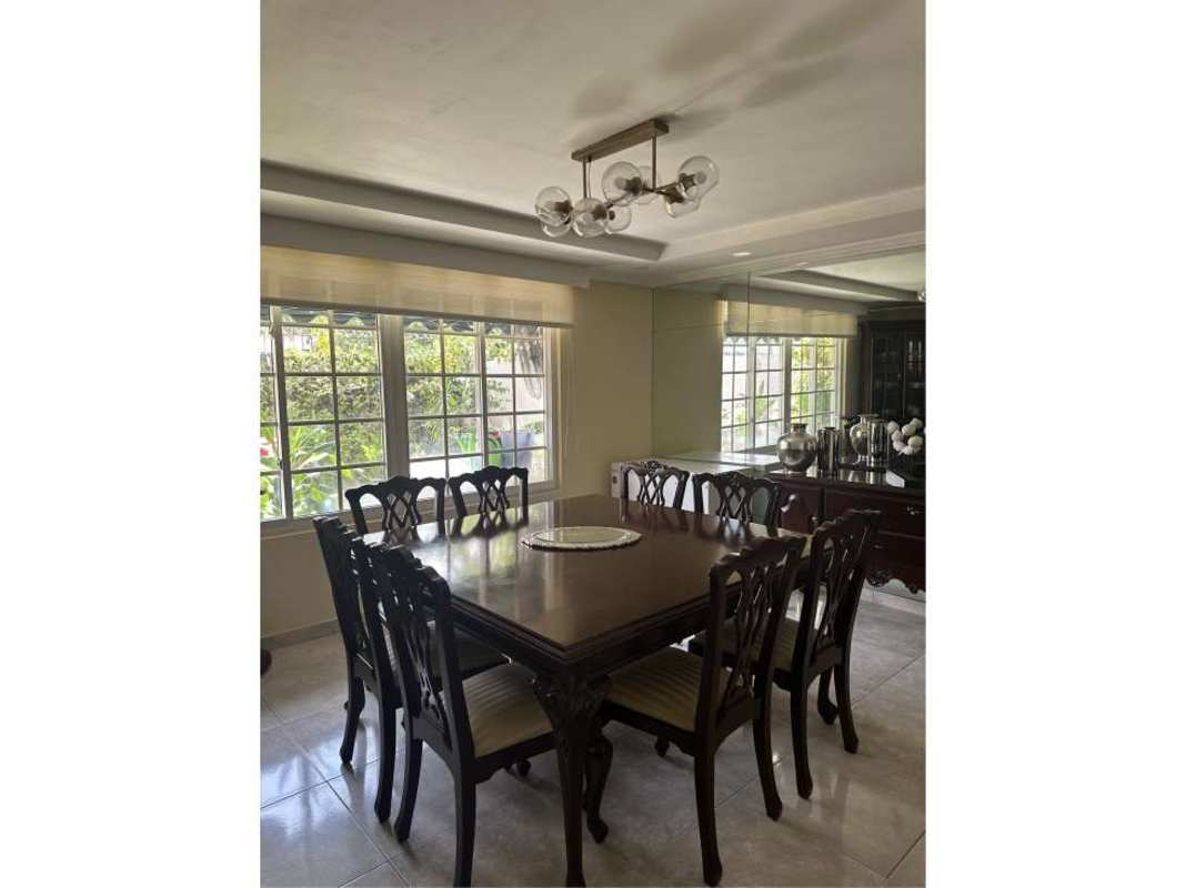 Private outdoor terrace and landscaped garden in Altos del Golf house Panama City for sale