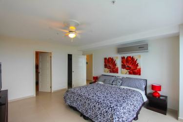 Contemporary bathroom with walk-in shower and granite vanity PH Coronado Bay Playa Coronado