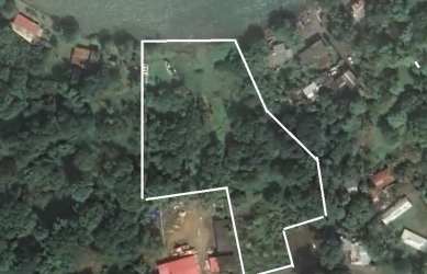 Aerial image of subdivided waterfront lots outlined in greenery at Juan Gallego near Isla Grande Panama