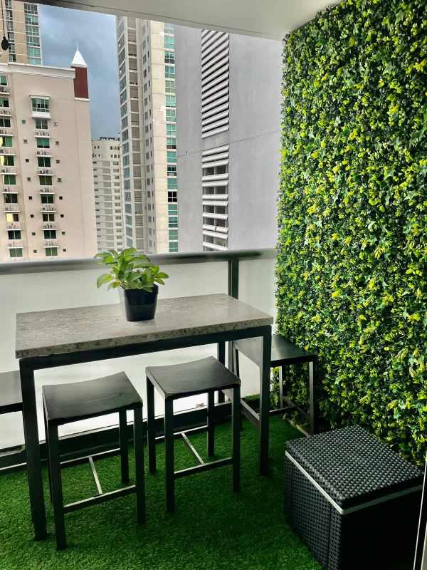 Private balcony with glass railing showing city skyline from PH Premium Tower Panama