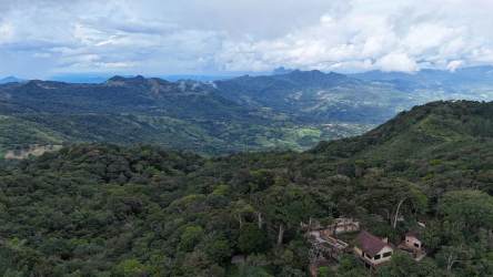 Mountain estate aerial photo overlooking valleys, dense forest Altos del María Panama